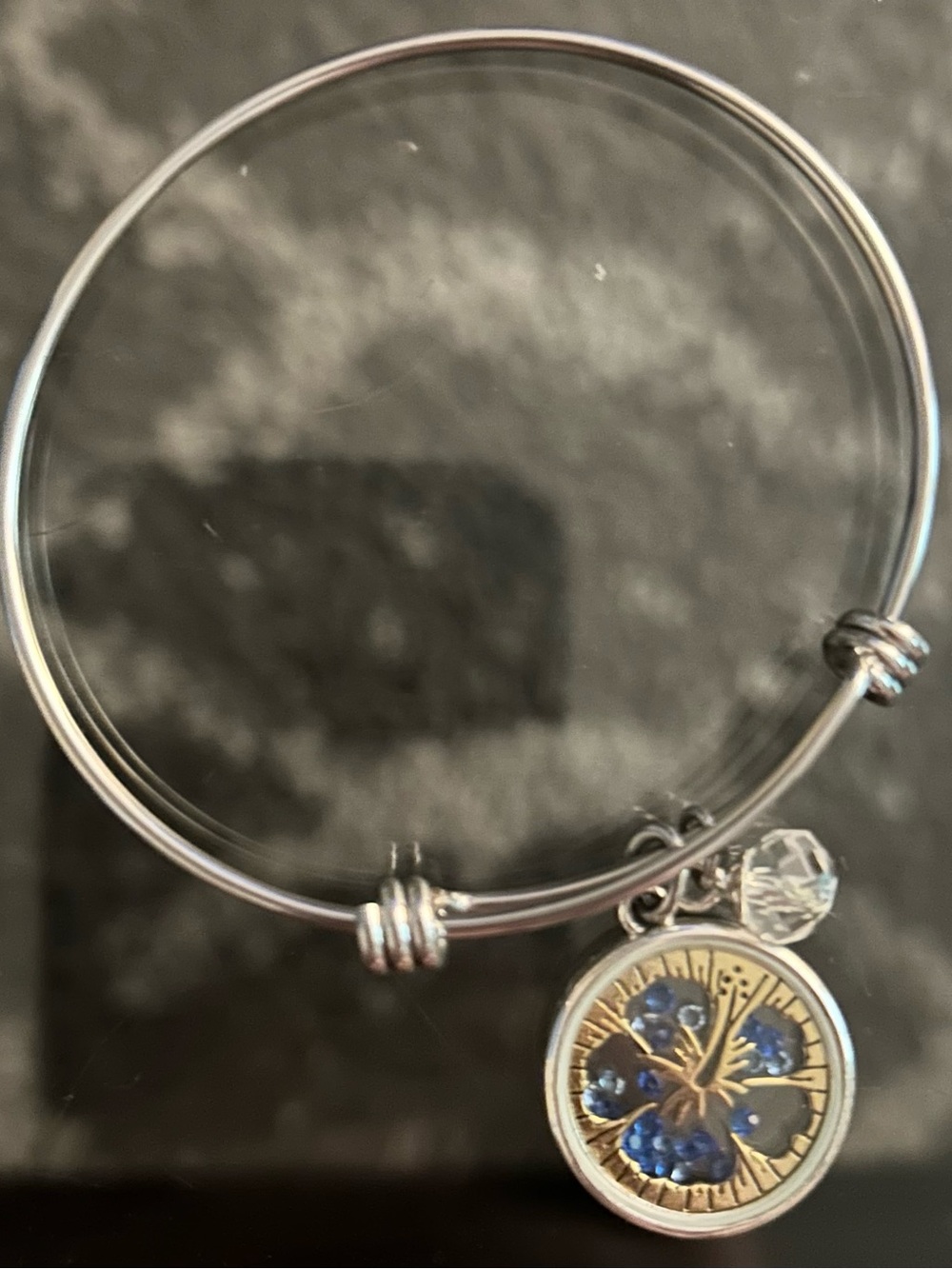 Silver-Tone Bangle Bracelet with Blue Flower Charm